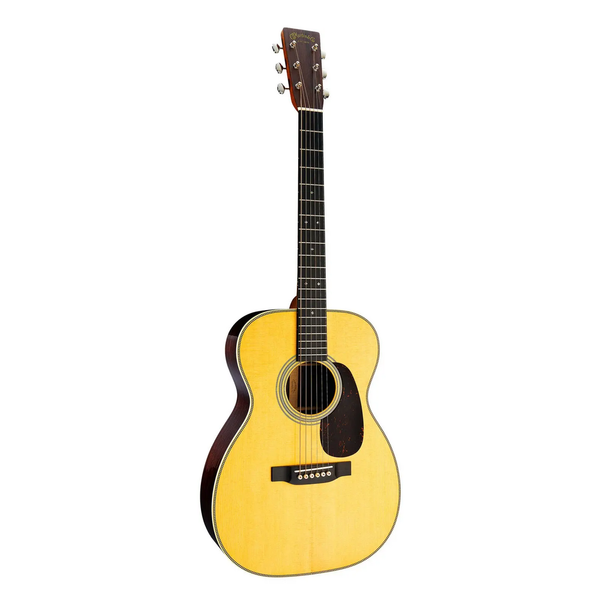 Yellow acoustic guitar on a white background